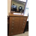 A retro Solid wood 5 drawer chest with metal handles and adjustable mirror.