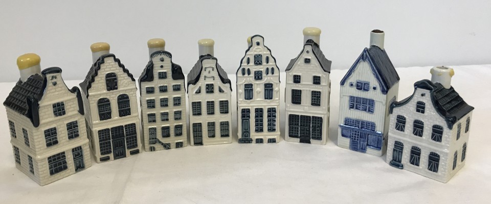 A collection of 8 Blue Delft KLM BOLS ceramic miniature houses to include c1950's example.