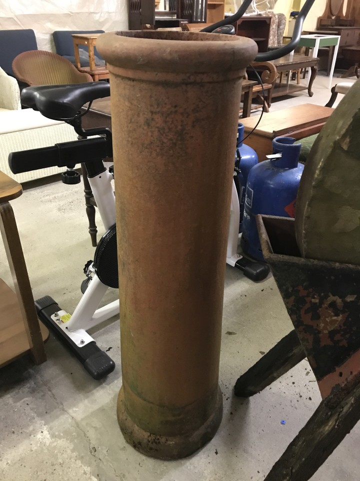 Vintage terracotta tall chimney pot.