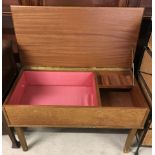 A vintage teak Sewing/work box with lift up lid.