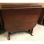 A small modern mahogany effect drop leaf gate leg table.