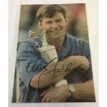 A signed picture of Nick Faldo.