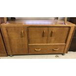 A light oak G Plan low sideboard.