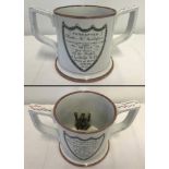 A large 1816 Sunderland Ware Masonic 2 handled mug with 2 frogs inside.