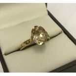 Rocks & Co 9ct gold dress ring set with Imperial Beryl and diamonds.