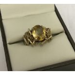 Vintage hallmarked 9ct gold ring set with an oval citrine.