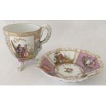 A 19th century Berlin decorative cabinet cup and saucer.