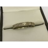 Vintage 9ct yellow gold half eternity ring set with 3 small diamonds.