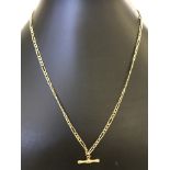 9ct gold fancy link chain necklace with 'T' bar hanging from the central point.