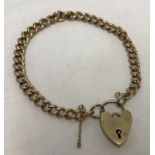 Vintage 9ct gold bracelet made from a watch chain with a heart shaped 'padlock' design clasp.