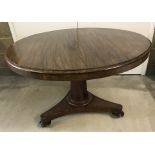 Victorian tilt top circular dining table.