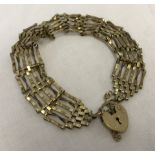 9ct gold 6 bar gate bracelet with heart shape 'padlock' clasp.