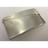 An antique silver card case.