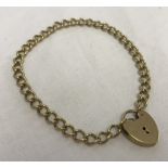 9ct gold chain bracelet with heart shape 'padlock' clasp.
