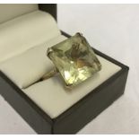 Vintage 9ct gold cocktail ring set with a very large square cut citrine.