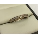 Vintage 9ct rose gold half eternity ring set with 3 small diamonds.