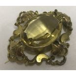 A vintage large ornate 9ct gold & citrine brooch.