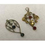 A 9ct gold Victorian pendant with 2 red stones.