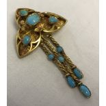 Vintage 3D turquoise set gold brooch with 3 tassels.