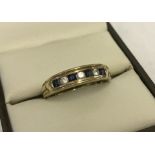 9ct gold 7 stone half eternity ring.