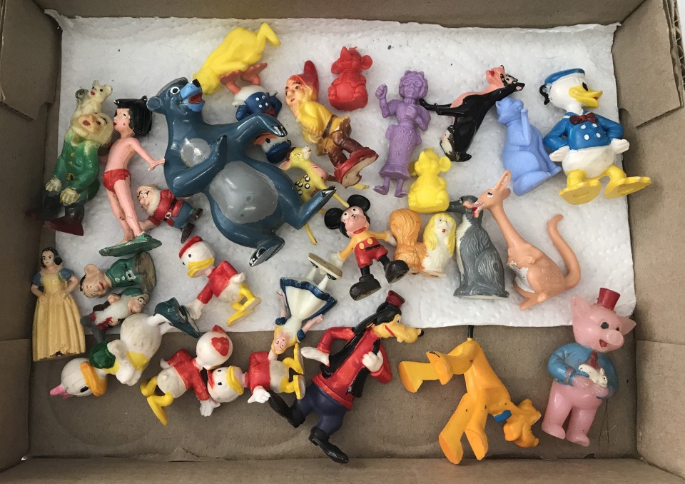 A collection of small plastic Disney figures to include Marx Disneykins.