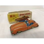 A boxed Chinese tinplate friction Fire Chief car.
