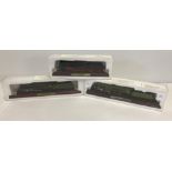 3 collectors model locomotives mounted on wooden plinth, in original sleeve.