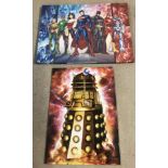A poster of a Dalek in a clip frame together with a canvas print of DC comic superheroes.