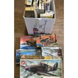 A large collection of unmade and part made model kits.
