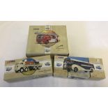 3 boxed Corgi classic vehicles.