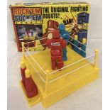 Mattel 'Rock 'Em Sock 'Em' fighting robots game.