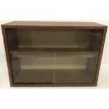 A wood effect wall hanging display cabinet.