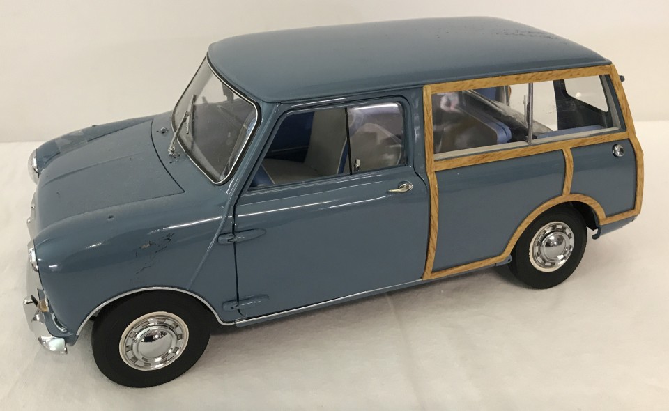 A Sun Star diecast 1960 Morris Mini Traveller, in pale blue.