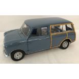 A Sun Star diecast 1960 Morris Mini Traveller, in pale blue.