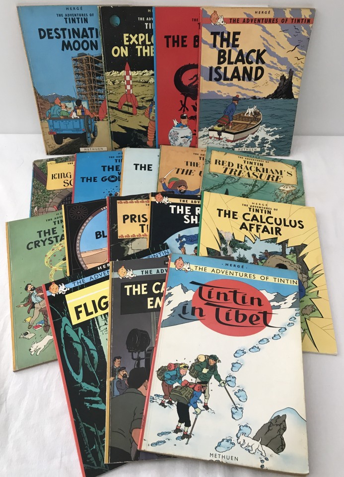 17 Tin Tin paperback comic books.