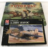 Waddington's Totopoly board game together with a Douglas A-20B/C Havoc plastic kit