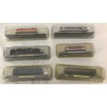 6 x N gauge model trains.