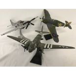 3 large Corgi Aviation Archive models of military aircraft on stands.