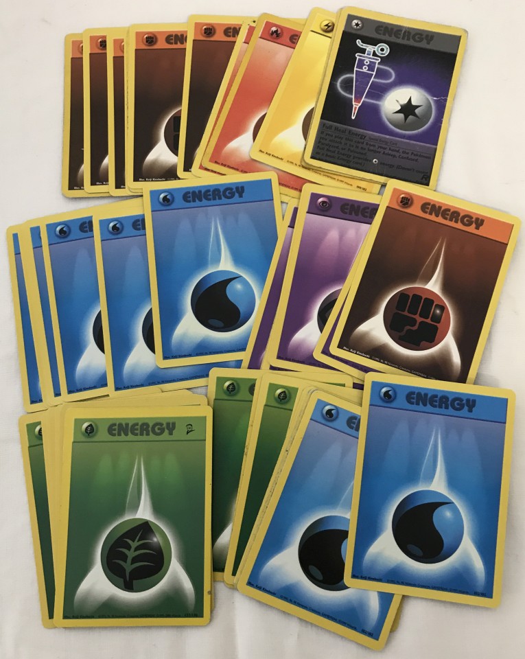 A collection of 50 Pokémon energy cards.