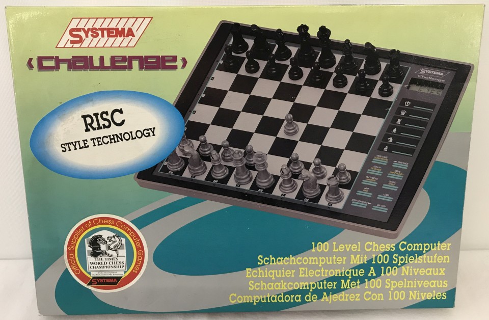 A vintage boxed Systema "Challenge" electronic chess game.