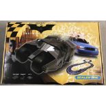 A boxed Batman Begins slot cars Scalextric racing set.