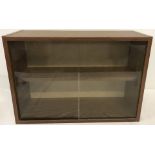 A wood effect wall hanging display cabinet.