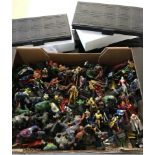 A large collection of metal painted DC and Marvel collectors figures with stands.