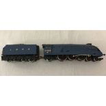 An unboxed Hornby 00 gauge LNER " Mallard " 4468 train and tender.