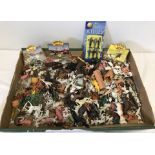 A box of plastic farm and zoo animals.