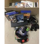 Playstation 2 console with controllers, cables and games.