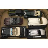 A collection of die cast convertible sports cars.