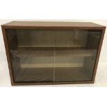 A wood effect wall hanging display cabinet.