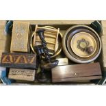 A box of assorted wooden items to include carved boxes, bowls and barley twist candle sticks.