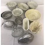 A collection of vintage ceramics, glass and metal jelly moulds.